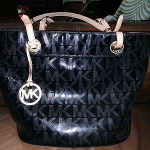 Authentic black Michael Kors jet set logo tote